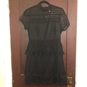 Little black dress with collar neck and ruffles